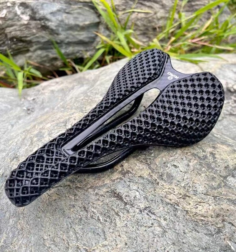 3D Printing Plastic - เบาะรองนั่งจักรยานแบบมีรูระบายอากาศ ผลิตจากคาร์บอนไฟเบอร์ พิมพ์ 3 มิติ สำหรับจักรยานเสือหมอบและเสือภูเขา
